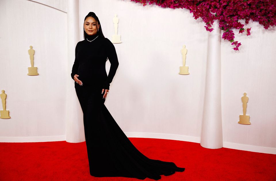 Vanessa Hudgens, who is pregnant, poses on the red carpet during the Oscars arrivals at the 96th Academy Awards in Hollywood, Los Angeles, California, U.S., March 10, 2024. REUTERS/Sarah Meyssonn