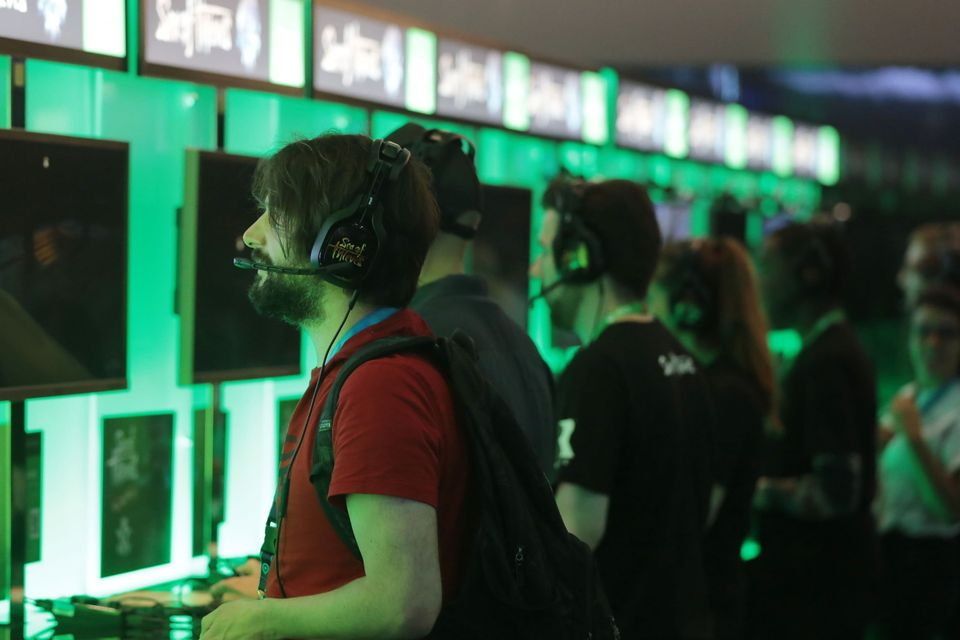 'Our goal is to launch this product at Gamescom at the end of August with Microsoft,' said Blacoe. Above, gamers at Gamescon in Germany. Photo: AP