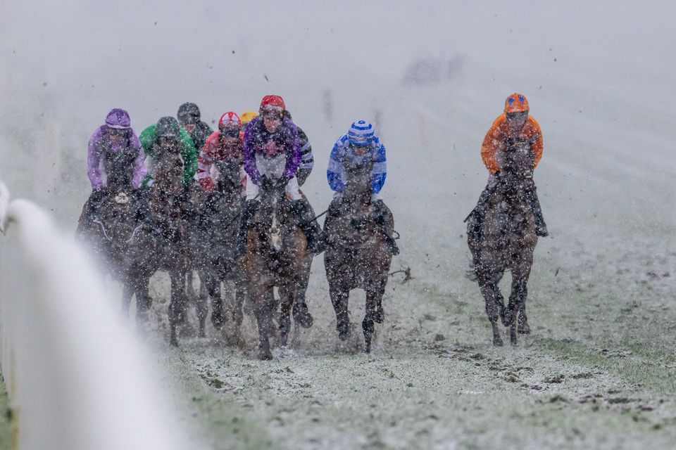 Low visibility during the last race at Naas Racecourse in Co Kildare yesterday. Photo: Inpho