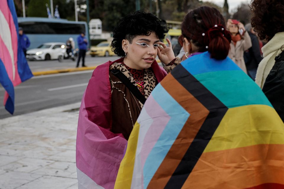 Supporters of the bill which legalises same-sex civil marriage gather in front of the Greek parliament, ahead of the vote, in Athens, Greece, February 15, 2024. REUTERS/Louisa Gouliamaki