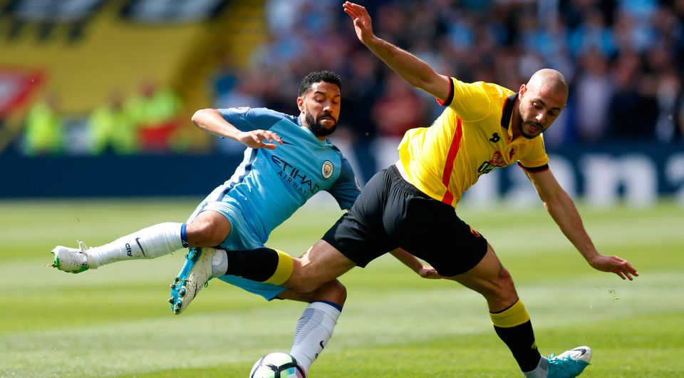 Manchester City's Gael Clichy in action with Watford's Nordin Amrabat. Photo: Reuters / Stefan Wermuth