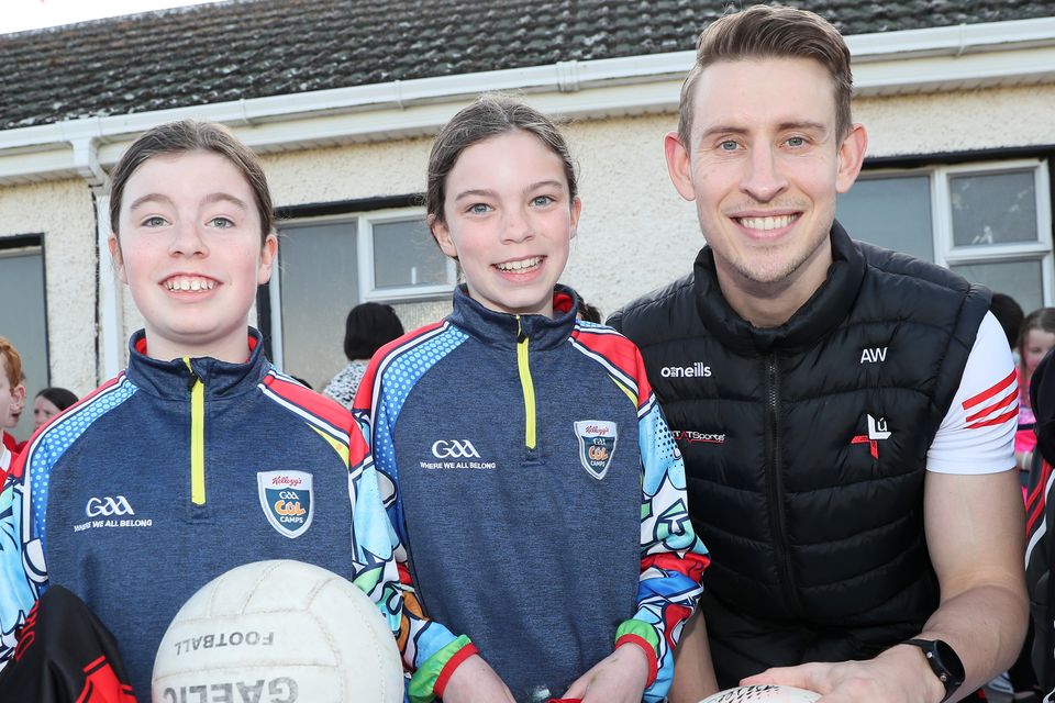 Mia and Kate McArdle with Louth player Anthony Williams at the Dreadnots GFC on Friday night.