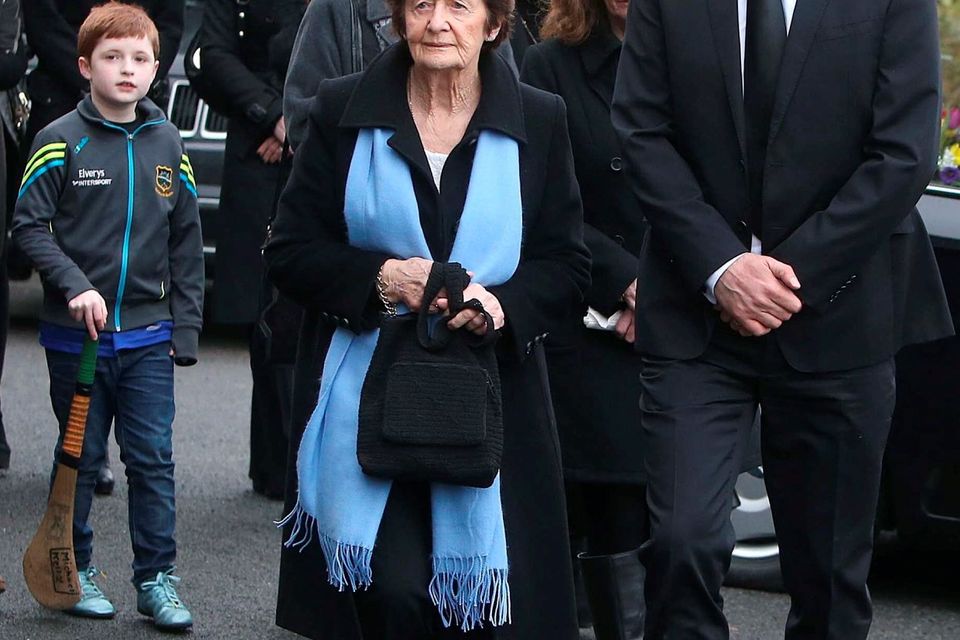 Niall Quinn, (son) and his mother, Mary, (wife), at St Marys Church, Killenaule, Co. Tipperary at the funeral of Billy Quinn
