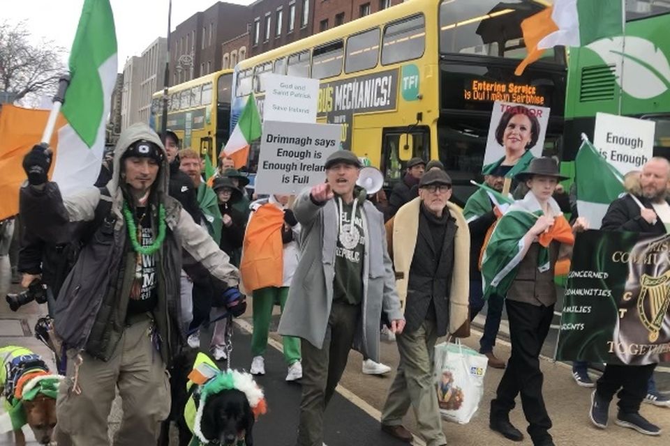 A group of protesters marched towards the St Patrick's Day parade route before being blocked by gardaí