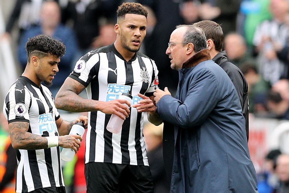 Jamaal Lascelles, centre, has signed a new long-term contract with Newcastle