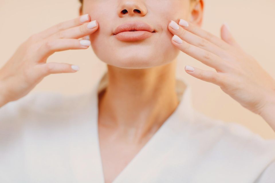 "Seeing as one of the face yoga exercises involves making a shocked-looking face, I’m asking all of my pals for their biggest gossip — but for beauty purposes only, I swear!" Stock image