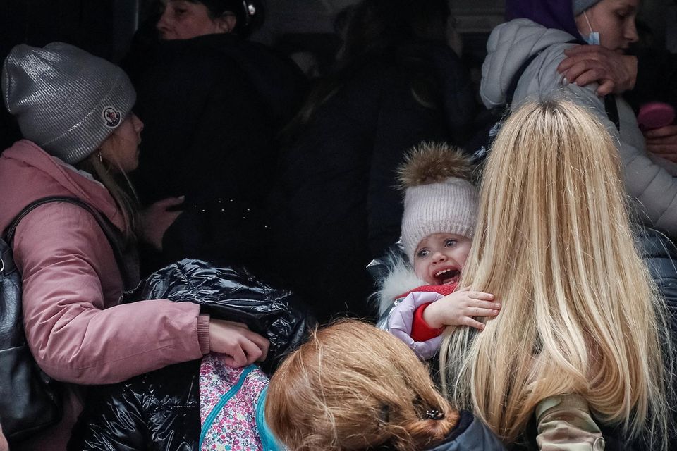 People board an evacuation train from Kyiv to Lviv at Kyiv central train station amid Russia's invasion. Picture: Reuters