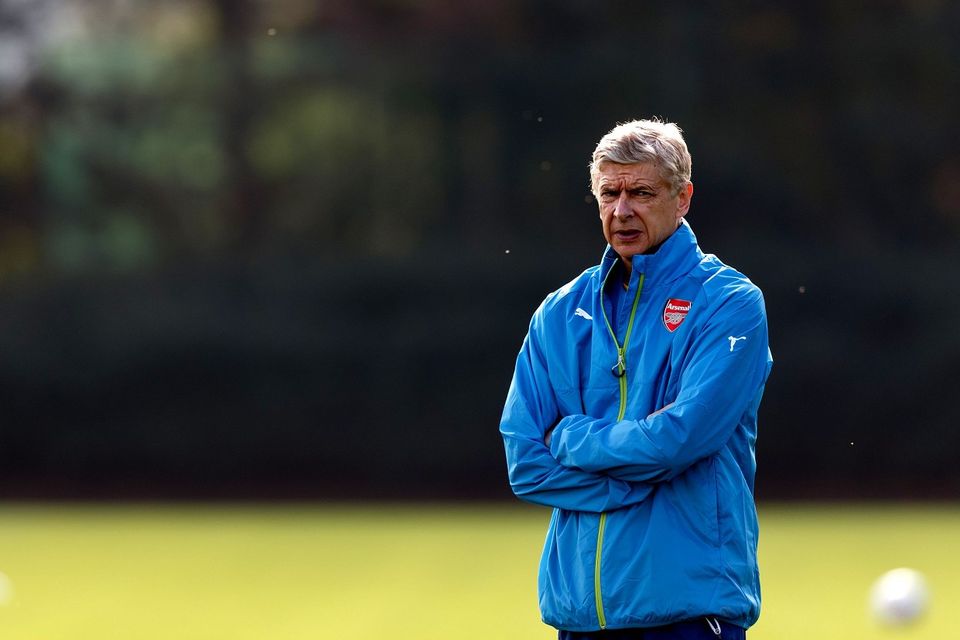 Arsenal manager Arsene Wenger during a training session at London Colney today