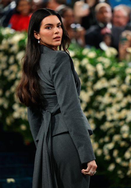 Kendall Jenner poses during the Met Gala, an annual fundraising gala held for the benefit of the Metropolitan Museum of Art's Costume Institute with this year's theme 'Superfine: Tailoring Black Style,' in New York City, New York, U.S., May 5, 2025. REUTERS/Mario Anzuoni
