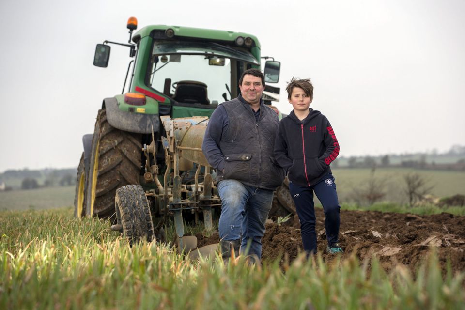 Brian O'Regan and son Patrick on their tillage farm in Dunderrow, Kinsale, Co Cork. Photo: Clare Keogh