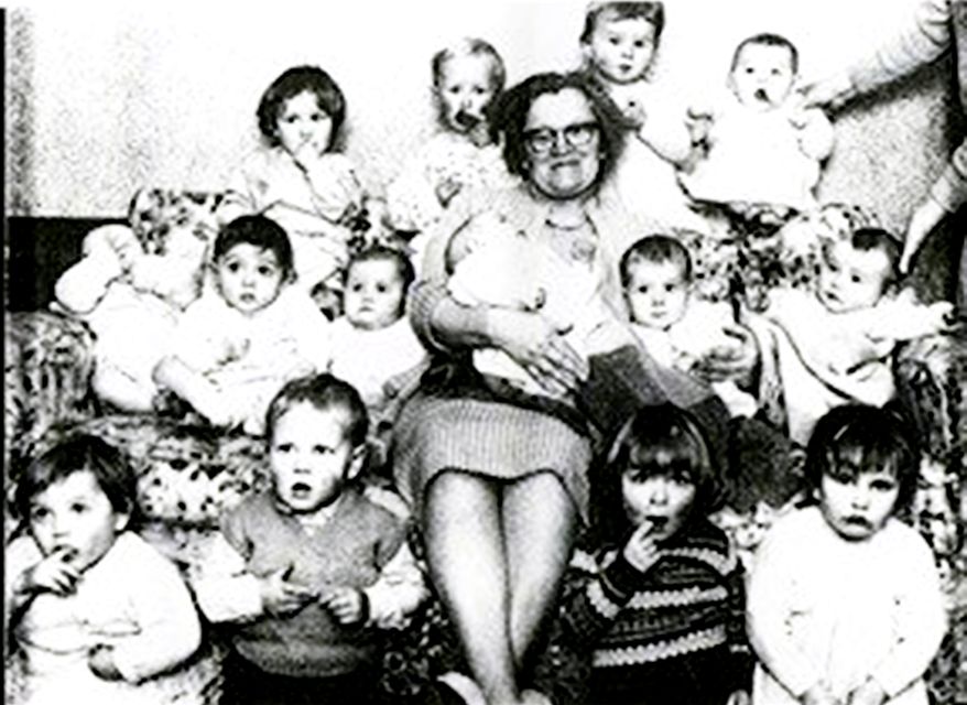 Adeline Mathers with children