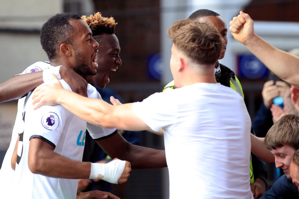 Jordan Ayew celebrates scoring Swansea's second goal in their Premier League win at Crystal Palace.