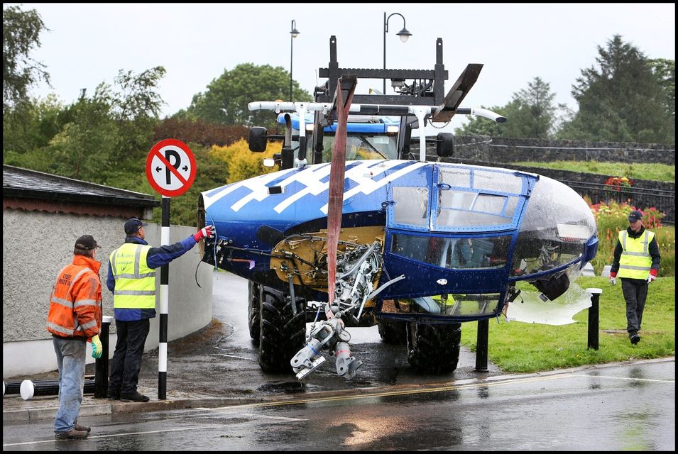Removing the helicopter from the crash site at the Rustic Inn pub in Abbeyschrule Longford.