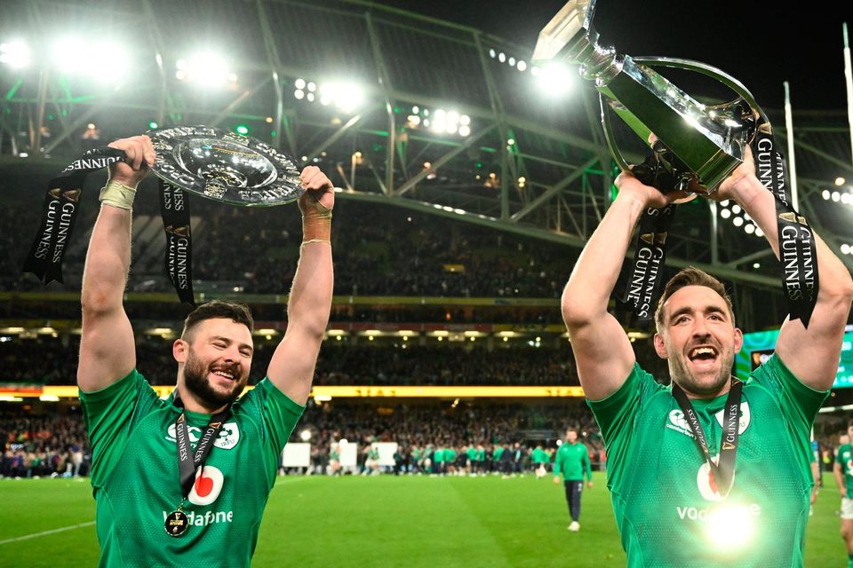 Robbie Henshaw and Jack Conan of Ireland lift the trophies after their side's victory over England. Photo by Harry Murphy/Sportsfile