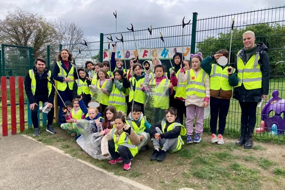 Second and third classes pupils from Woodstock Educate Together National School launching their Junior Tidy Towns group with members of Newtown Tidy Towns.