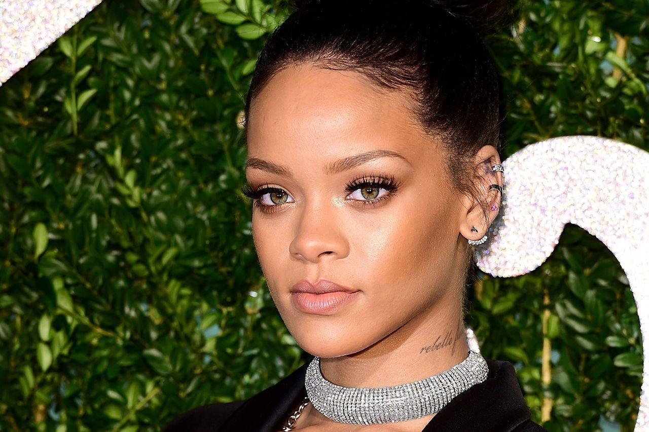 Rihanna Helpfully Demonstrates the Proper Way to Wear Those Manolo Blahnik  Denim Boots - Racked