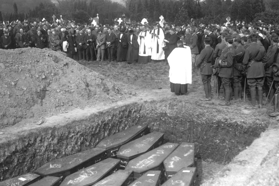 The majority were buried in three mass graves, with 80 remaining nameless. Playing on his mind as he marched was, perhaps, the
question: 'Could I have done more to find out who they were' - a funeral service in Cobh held for some of the victims