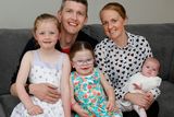 thumbnail: Emma and John O'Connor with their daughters Aoibhe (8), Lauren (5) and baby Megan