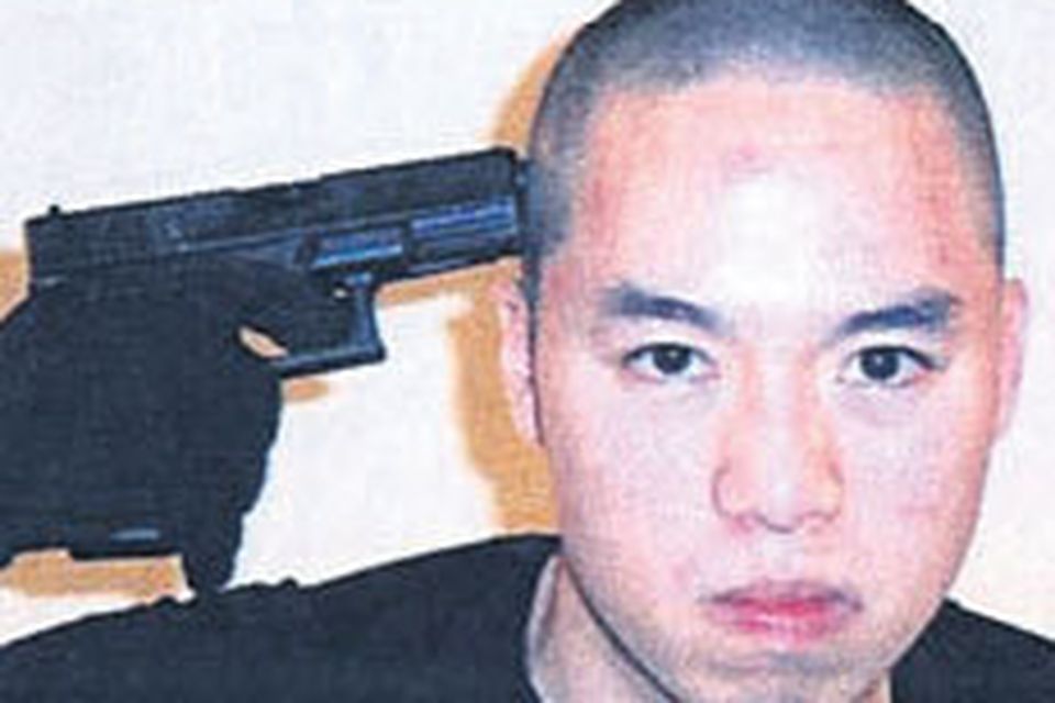 Video diary of a mass murderer: Cho Seung-Hui in the film and photographs he packaged and sent to US television network NBC in between the first and second shooting sprees