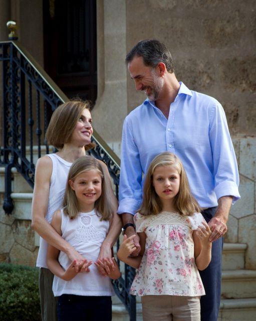 Spanish King Felipe VI (top R) and Queen Letizia (top L) pose with their daughters Spanish crown princess Leonor (bottom R) and princess Sofia at the Marivent Palace on the island of Mallorca on August 3, 2015. AFP PHOTO/ JAIME REINAJAIME REINA/AFP/Getty Images