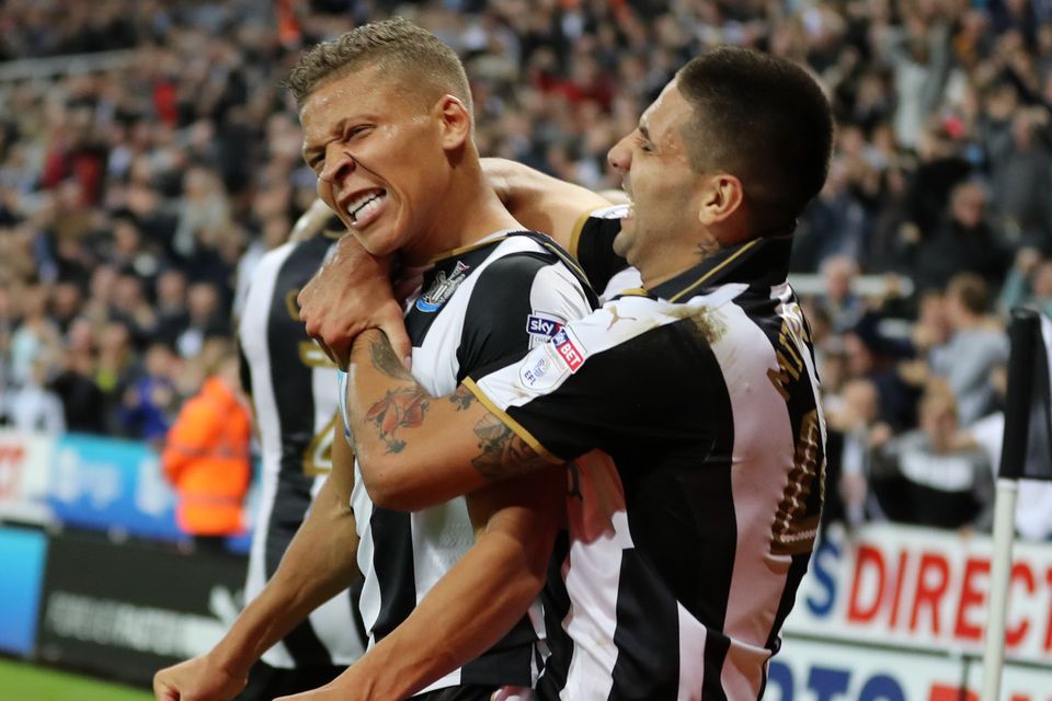 Newcastle striker Dwight Gayle, left, celebrates with Aleksandar Mitrovic after scoring his winning goal against Norwich