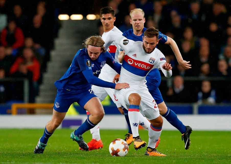 Tom Davies and Lyon's Lucas Tousart battle for possession. Photo: REUTERS/Andrew Yates