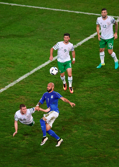 James McCarthy clears the ball from Simone Zaza . Photo by Ray McManus / Sportsfile