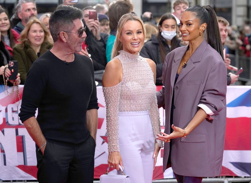 (left to right) Britain’s Got Talent judges Simon Cowell, Amanda Holden and Alesha Dixon (Steve Parsons/PA)