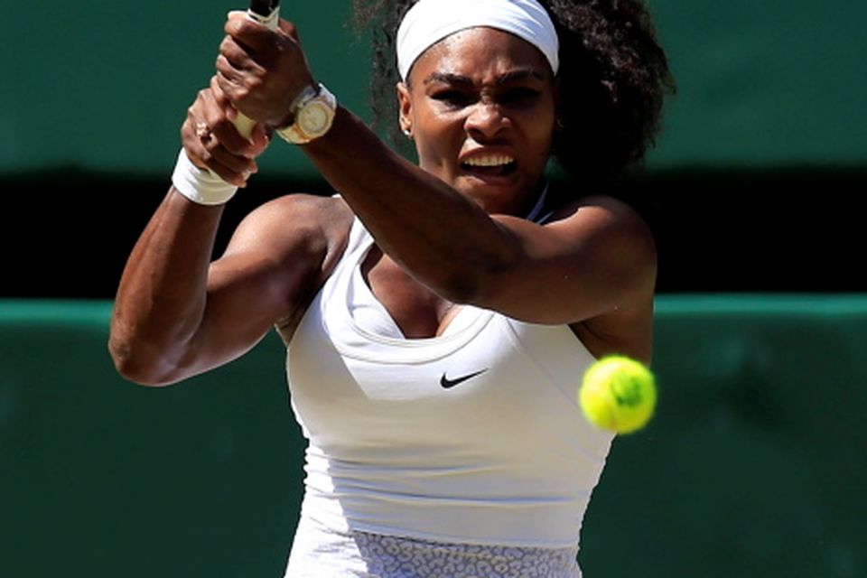 Serena Williams in action against Garbine Muguruza in the Ladies' Singles Final during day Twelve of the Wimbledon Championships at the All England Lawn Tennis and Croquet Club, Wimbledon. PRESS ASSOCIATION Photo. Picture date: Saturday July 11, 2015.  See PA Story TENNIS Wimbledon. Photo credit should read: Jonathan Brady/PA Wire. RESTRICTIONS: Editorial use only. No commercial use without prior written consent of the AELTC. Still image use only - no moving images to emulate broadcast. No superimposing or removal of sponsor/ad logos. Call +44 (0)1158 447447 for further information.