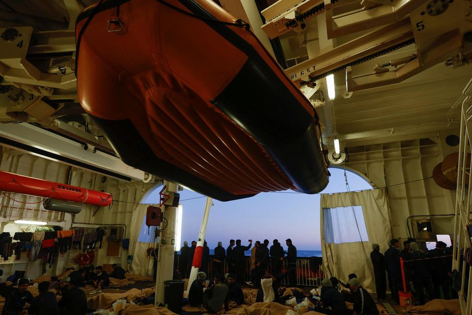 Rescued migrants on the Geo Barents rescue ship, operated by Medecins Sans Frontieres in the Mediterranean Sea on Saturday. Photo: REUTERS/Darrin Zammit Lupi.