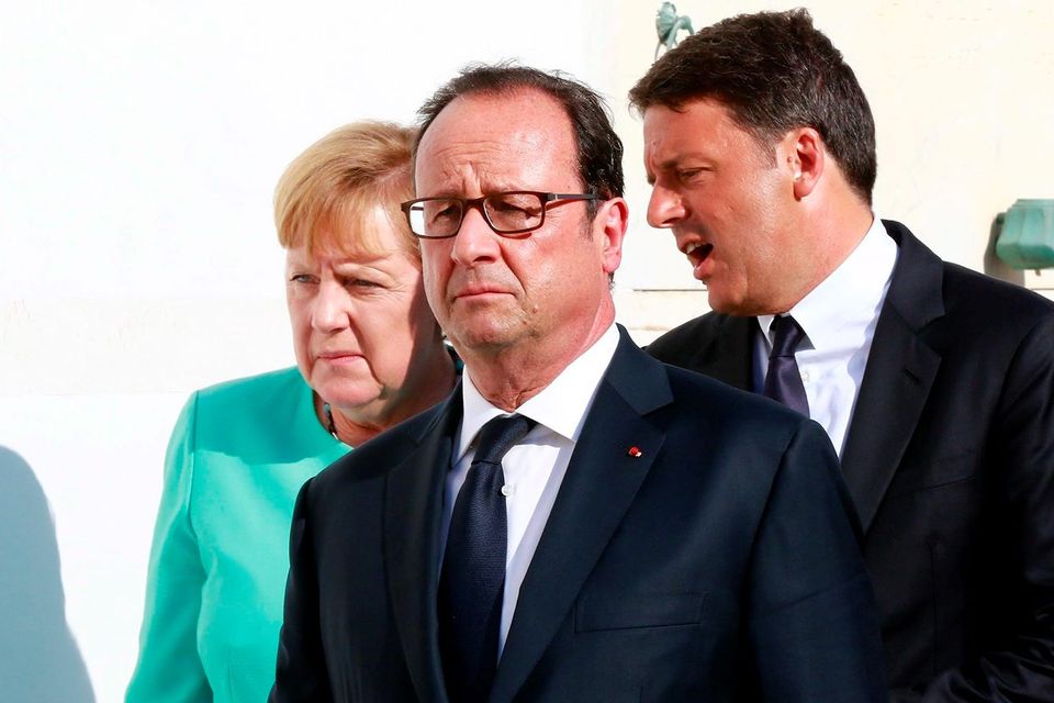 Italian Premier Matteo Renzi, right, French President Francois Holland, center, and German Chancellor Angela Merkel. Photo: Carlo Hermann/Pool Photo via AP