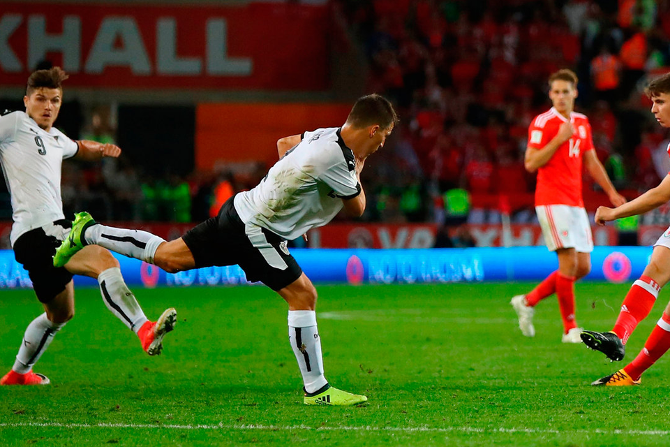 Ben Woodburn of Wales (22) scores   Photo: Getty