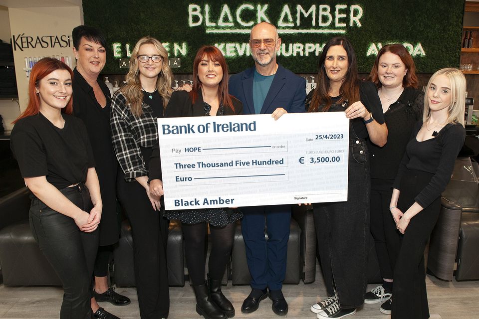 Staff from Black Amber pictured with a cheque for €3,500 which was raised by a fundraiser for Hope in memory of Emma Quigley in the studio recently. (l to r)- Moly Ring, Siobhan Hayes, Donna Gardiner, Samantha Fortune, Liam Kennedy, Kate McDonald, Niamh Fleming, Keisha McEarron. Pic: Jim Campbell