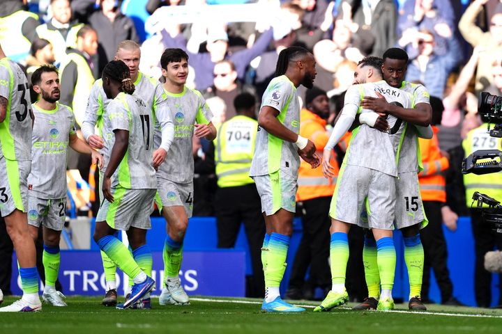 Manchester City close gap on leaders Arsenal after easing to victory at Chelsea