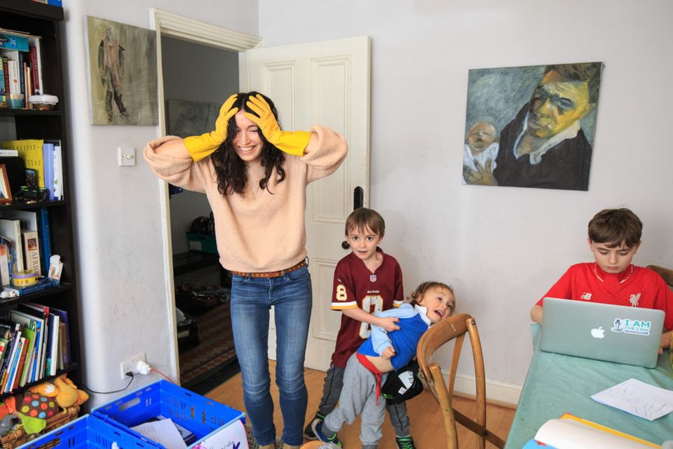 Mary McCarthy at home with her children John (11), Dermot (7) and Aris (3). Photo: Mark Condren