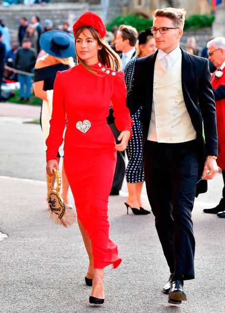Emma Louise Connolly and Oliver Proudlock arrive for the wedding of Princess Eugenie to Jack Brooksbank at St George's Chapel in Windsor Castle