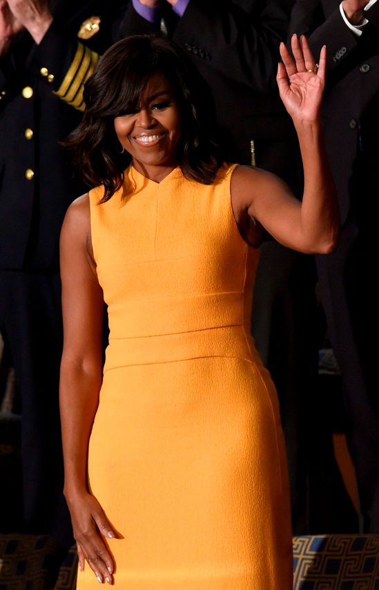 Michelle Obama steals the show in yellow dress at State of the Union address Irish Independent