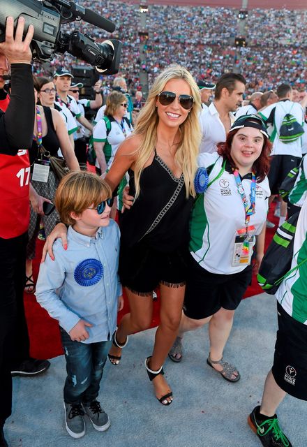 Team Ireland’s Aoife O’Sullivan, a member of Owenabue Special Olympics Gymnastics Club, from Cork City, with Claudine Keane and her son Robert during the opening ceremony of the Special Olympics World Summer Games. LA Memorial Coliseum, Los Angeles, United States. Picture credit: Ray McManus / SPORTSFILE