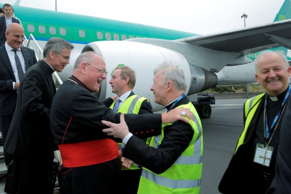 09/08/2015 Cardinal TImothy Dolan, Archbishop of New York and  archbishop Charles Brown, Papal Nuncio to Ireland being greeted by An Taoiseach Enda Kenny and Archbishop of Tuam Michael Neary after arriving on the Aer Lingus flight carrying pilgrims from New York to Knock Shrine at Ireland West Airport Knock. Photo : Keith Heneghan / Phocus