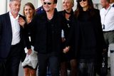 thumbnail: Bono and his wife Ali Hewson arrive to take a taxi boat. Photo credit: REUTERS/Stefano Rellandini