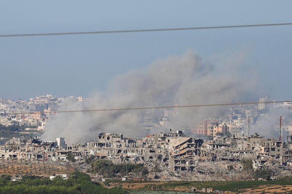 Smoke rises over Gaza, as seen from Israel's border with Gaza, in southern Israel October 30, 2023. REUTERS/Evelyn Hockstein