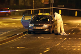 thumbnail: Gardai at the scene of the shooting at the Bridge of Peace