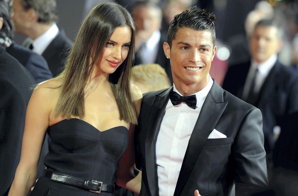 Cristiano Ronaldo, right, arrives with his girlfriend Irina Shayk, left, on the red carpet prior to the FIFA Ballon d'Or Gala 2013
