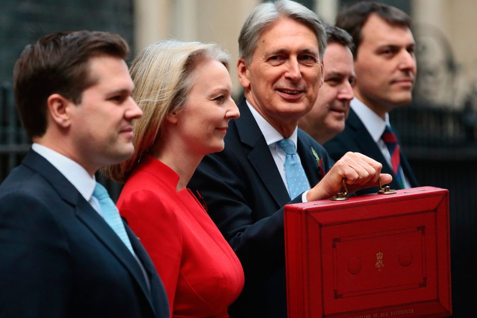Box office: UK chancellor Philip Hammond shows off the traditional red box ahead of his Budget speech. Photo: Getty Images