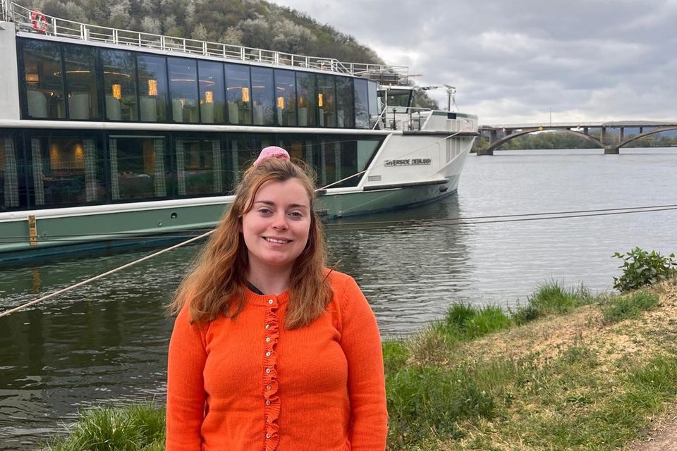 Amy Donohoe with the Debussy ship, Riverside Luxury Cruises.