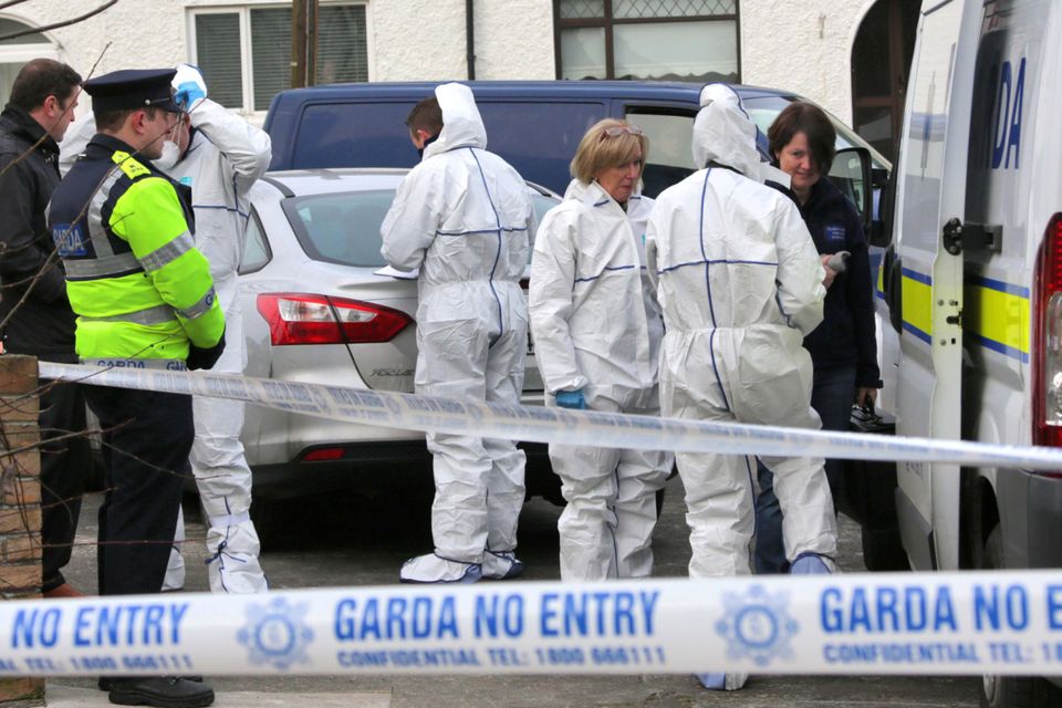 Gardai and State Pathologist, Dr. Marie Cassidy pictured at the scene where the body of a man in his 40's was found in a house on Glendu Rd. Cabra