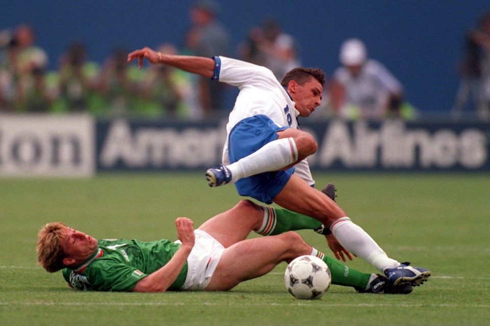 Ireland's Andy Townsend tackles Italy's Roberto Baggio during their 1994 World Cup opener in Giants Stadium, New Jersey which Ireland famously won 1-0. Italy would recover from the loss and make the final against Brazil with Baggio, one of the biggest stars in the game, missing his kick in the penalty shoot-out.