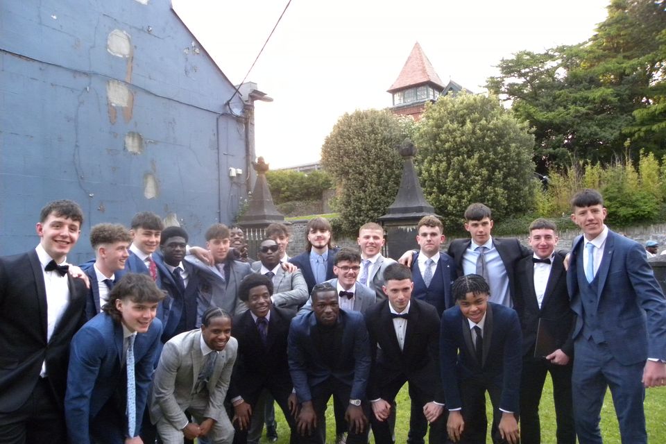 Sixth year boys outside Calry Church after the Service.