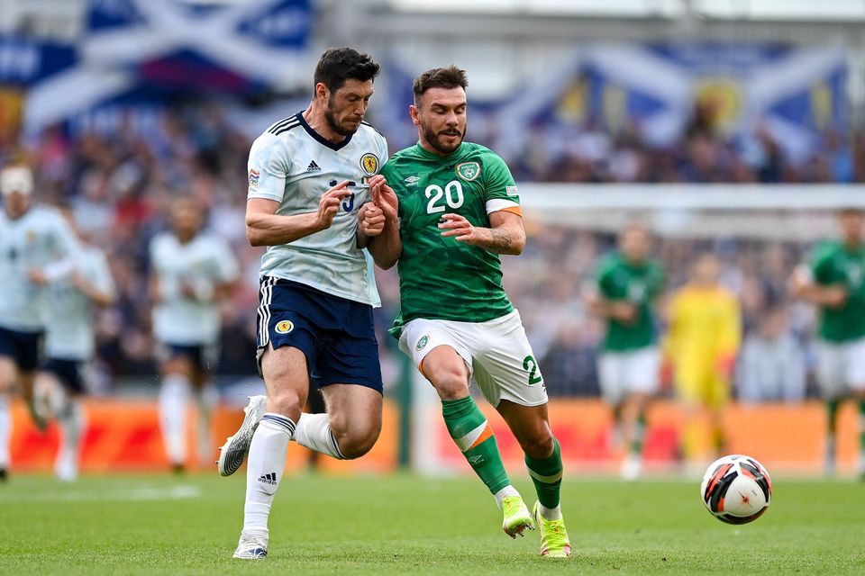 Ireland's Scott Hogan in action against Scott McKenna of Scotland during the UEFA Nations League B match in 2022. Photo: Seb Daly/Sportsfile