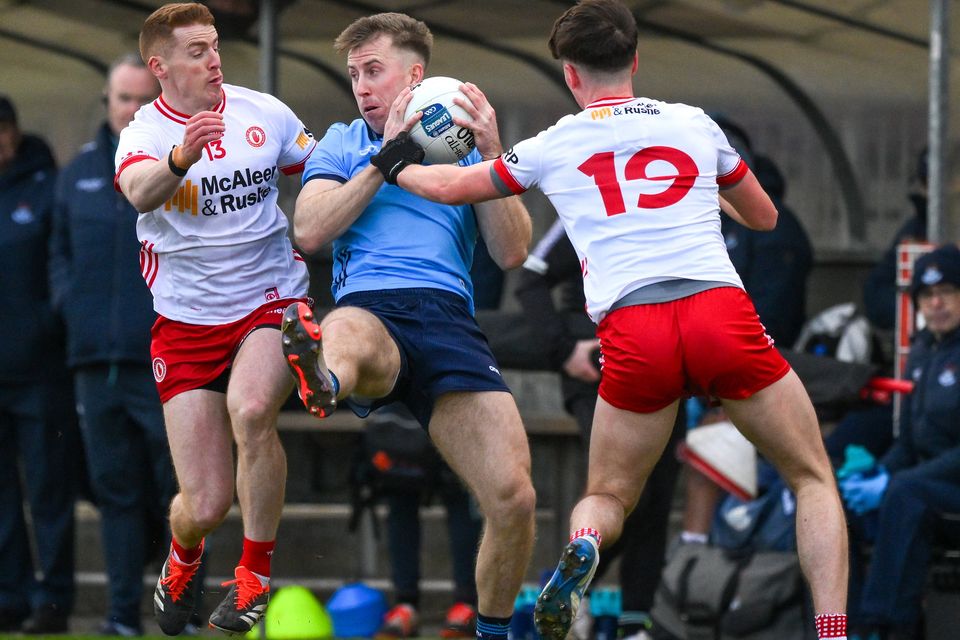 Seán Bugler of Dublin in action against Peter Harte and Aodhan Donaghy of Tyrone. Photo by Ray McManus/Sportsfile